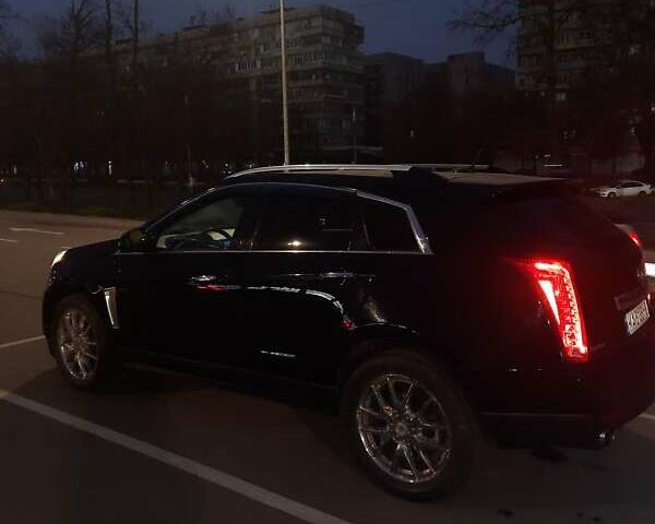 Черный Кадиллак СРХ, объемом двигателя 3.56 л и пробегом 202 тыс. км за 11800 $, фото 1 на Automoto.ua