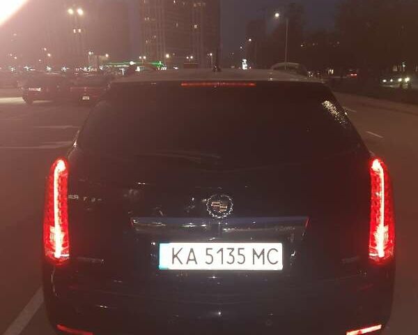 Черный Кадиллак СРХ, объемом двигателя 3.56 л и пробегом 202 тыс. км за 11800 $, фото 2 на Automoto.ua