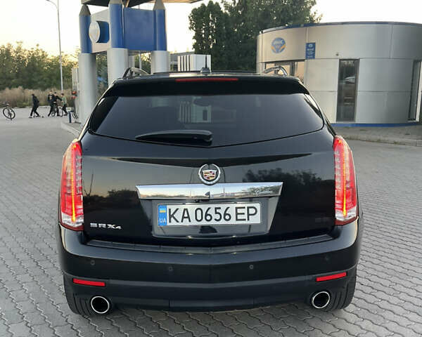 Черный Кадиллак СРХ, объемом двигателя 3.6 л и пробегом 210 тыс. км за 14500 $, фото 1 на Automoto.ua
