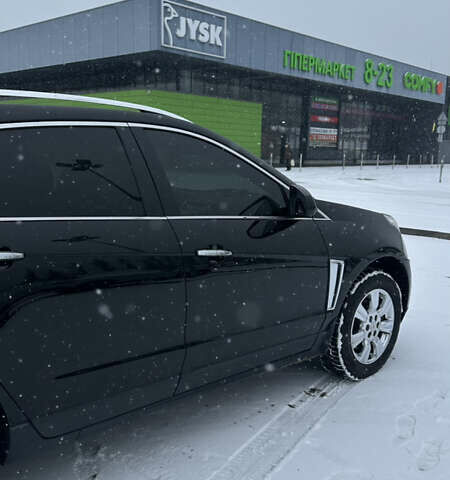 Чорний Каділак SRX, об'ємом двигуна 3.6 л та пробігом 192 тис. км за 12000 $, фото 8 на Automoto.ua