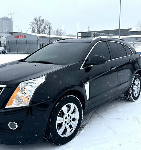 Чорний Каділак SRX, об'ємом двигуна 3.6 л та пробігом 192 тис. км за 12000 $, фото 7 на Automoto.ua