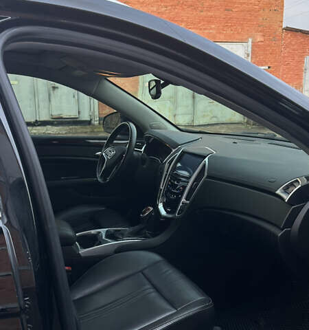 Черный Кадиллак СРХ, объемом двигателя 3.6 л и пробегом 189 тыс. км за 12300 $, фото 6 на Automoto.ua