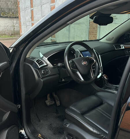 Черный Кадиллак СРХ, объемом двигателя 3.6 л и пробегом 189 тыс. км за 12300 $, фото 7 на Automoto.ua