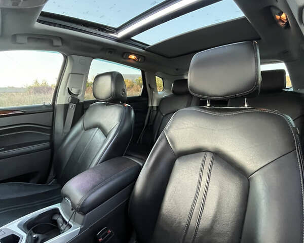 Черный Кадиллак СРХ, объемом двигателя 3.6 л и пробегом 210 тыс. км за 14500 $, фото 24 на Automoto.ua