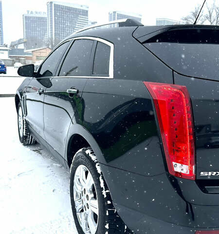 Чорний Каділак SRX, об'ємом двигуна 3.6 л та пробігом 192 тис. км за 12000 $, фото 6 на Automoto.ua