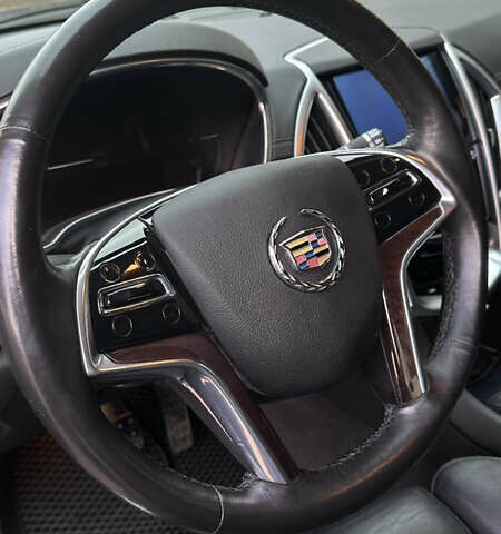 Чорний Каділак SRX, об'ємом двигуна 3.6 л та пробігом 192 тис. км за 12000 $, фото 15 на Automoto.ua