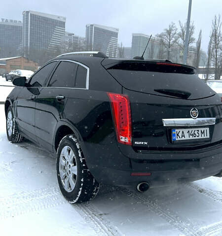Чорний Каділак SRX, об'ємом двигуна 3.6 л та пробігом 192 тис. км за 12000 $, фото 5 на Automoto.ua