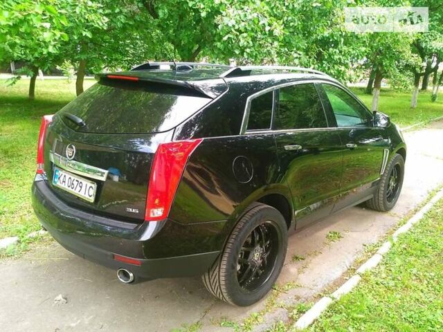 Чорний Каділак SRX, об'ємом двигуна 3.6 л та пробігом 170 тис. км за 15800 $, фото 17 на Automoto.ua