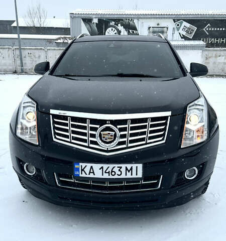 Чорний Каділак SRX, об'ємом двигуна 3.6 л та пробігом 192 тис. км за 12000 $, фото 1 на Automoto.ua