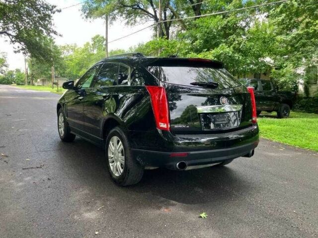 Чорний Каділак SRX, об'ємом двигуна 3.6 л та пробігом 64 тис. км за 3600 $, фото 4 на Automoto.ua