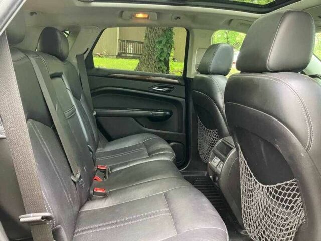 Чорний Каділак SRX, об'ємом двигуна 3.6 л та пробігом 64 тис. км за 3600 $, фото 12 на Automoto.ua