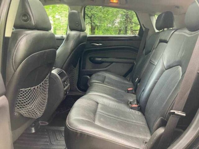 Чорний Каділак SRX, об'ємом двигуна 3.6 л та пробігом 64 тис. км за 3600 $, фото 11 на Automoto.ua