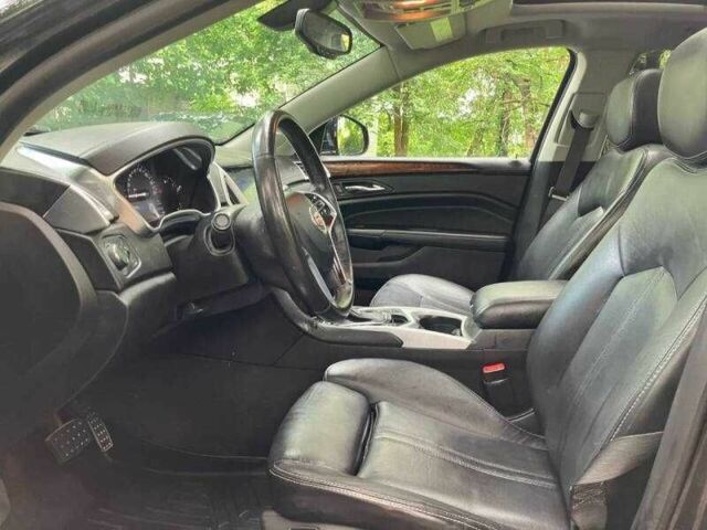 Чорний Каділак SRX, об'ємом двигуна 3.6 л та пробігом 64 тис. км за 3600 $, фото 8 на Automoto.ua