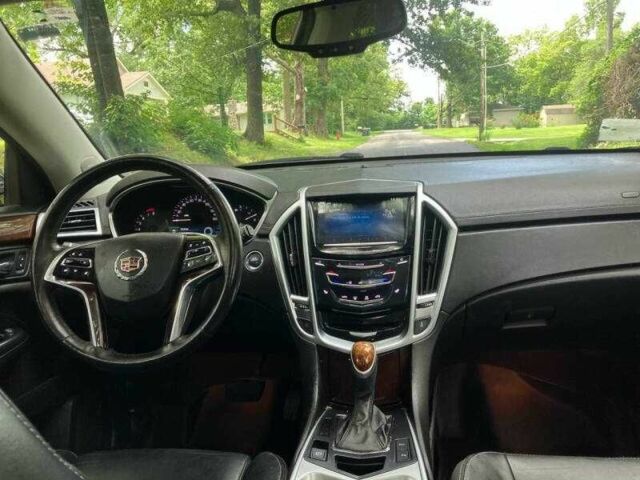 Чорний Каділак SRX, об'ємом двигуна 3.6 л та пробігом 64 тис. км за 3600 $, фото 9 на Automoto.ua