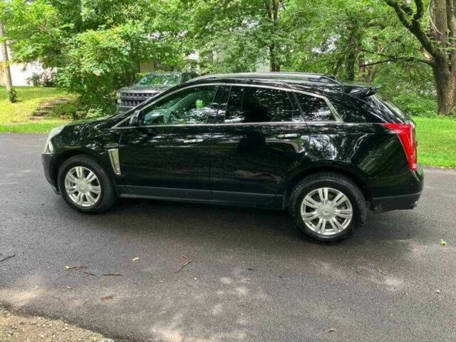 Чорний Каділак SRX, об'ємом двигуна 3.6 л та пробігом 64 тис. км за 3600 $, фото 5 на Automoto.ua