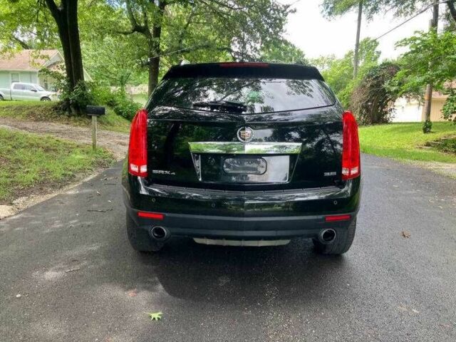 Чорний Каділак SRX, об'ємом двигуна 3.6 л та пробігом 64 тис. км за 3600 $, фото 3 на Automoto.ua