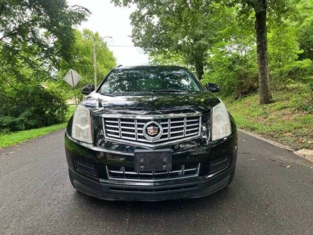 Чорний Каділак SRX, об'ємом двигуна 3.6 л та пробігом 64 тис. км за 3600 $, фото 7 на Automoto.ua