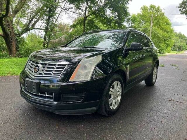 Чорний Каділак SRX, об'ємом двигуна 3.6 л та пробігом 64 тис. км за 3600 $, фото 6 на Automoto.ua