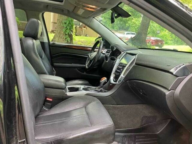 Чорний Каділак SRX, об'ємом двигуна 3.6 л та пробігом 64 тис. км за 3600 $, фото 14 на Automoto.ua