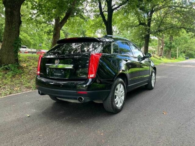 Чорний Каділак SRX, об'ємом двигуна 3.6 л та пробігом 64 тис. км за 3600 $, фото 2 на Automoto.ua