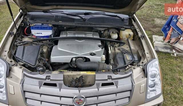 Желтый Кадиллак СРХ, объемом двигателя 3.6 л и пробегом 54 тыс. км за 6700 $, фото 1 на Automoto.ua