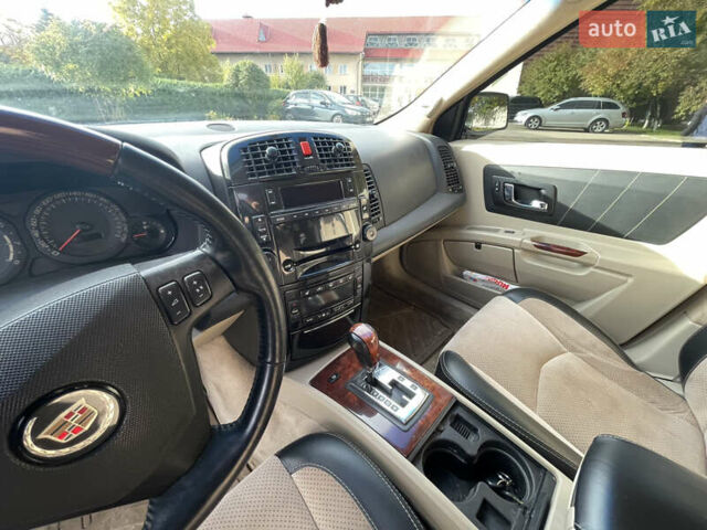 Серый Кадиллак СРХ, объемом двигателя 4.57 л и пробегом 125 тыс. км за 7800 $, фото 27 на Automoto.ua