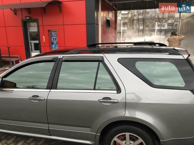 Сірий Каділак SRX, об'ємом двигуна 4.57 л та пробігом 129 тис. км за 7444 $, фото 1 на Automoto.ua