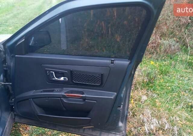 Сірий Каділак SRX, об'ємом двигуна 4.6 л та пробігом 180 тис. км за 4000 $, фото 4 на Automoto.ua