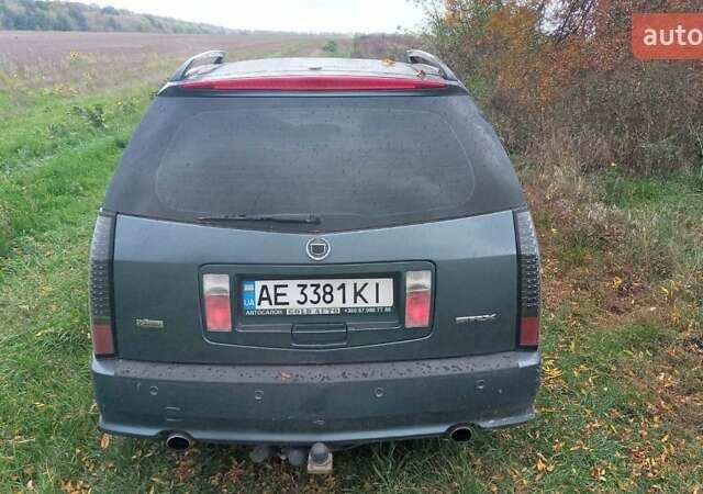 Сірий Каділак SRX, об'ємом двигуна 4.6 л та пробігом 180 тис. км за 4000 $, фото 13 на Automoto.ua