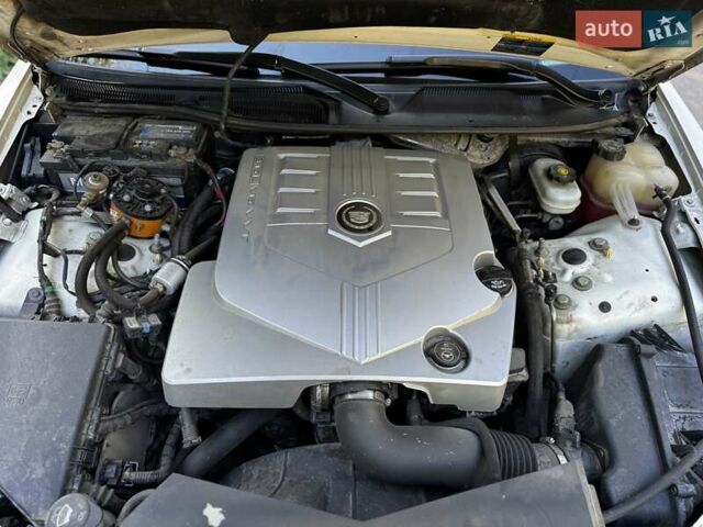 Білий Каділак STS, об'ємом двигуна 3.6 л та пробігом 225 тис. км за 7900 $, фото 26 на Automoto.ua