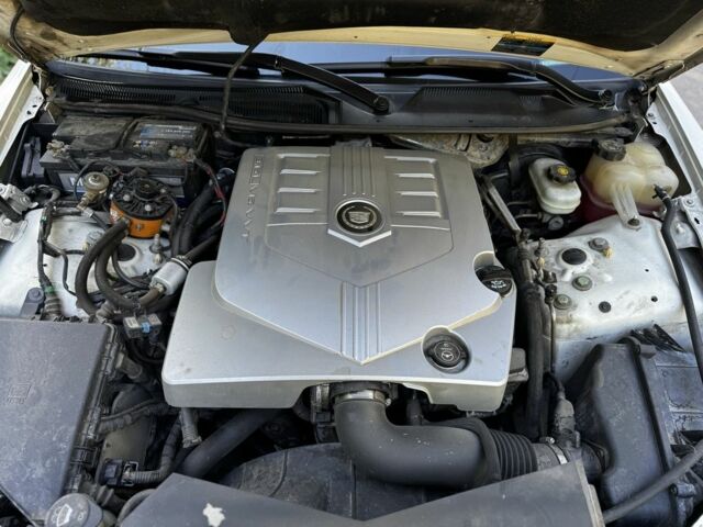 Білий Каділак STS, об'ємом двигуна 3.6 л та пробігом 225 тис. км за 7900 $, фото 12 на Automoto.ua