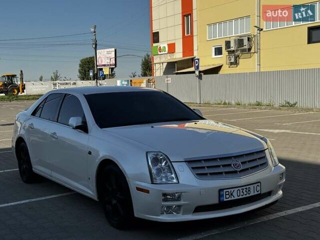 Білий Каділак STS, об'ємом двигуна 3.6 л та пробігом 225 тис. км за 7900 $, фото 33 на Automoto.ua