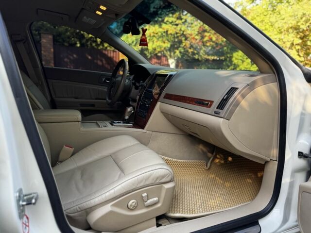 Білий Каділак STS, об'ємом двигуна 3.6 л та пробігом 225 тис. км за 7900 $, фото 9 на Automoto.ua