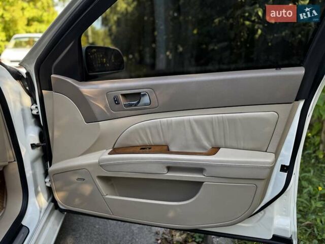 Білий Каділак STS, об'ємом двигуна 3.6 л та пробігом 225 тис. км за 7900 $, фото 24 на Automoto.ua