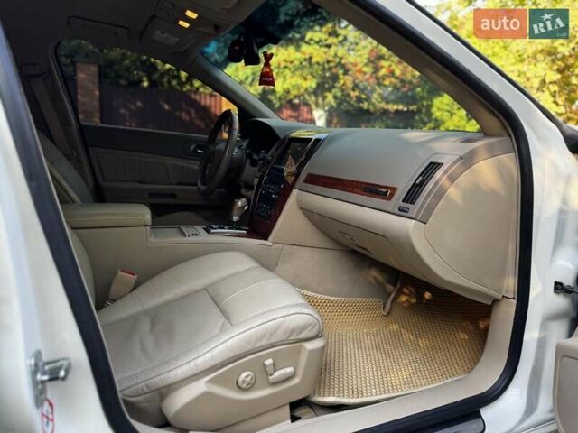 Білий Каділак STS, об'ємом двигуна 3.6 л та пробігом 225 тис. км за 7900 $, фото 20 на Automoto.ua