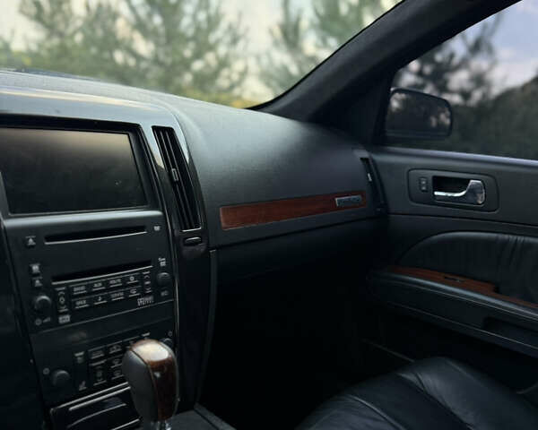 Чорний Каділак STS, об'ємом двигуна 4.6 л та пробігом 284 тис. км за 5700 $, фото 27 на Automoto.ua