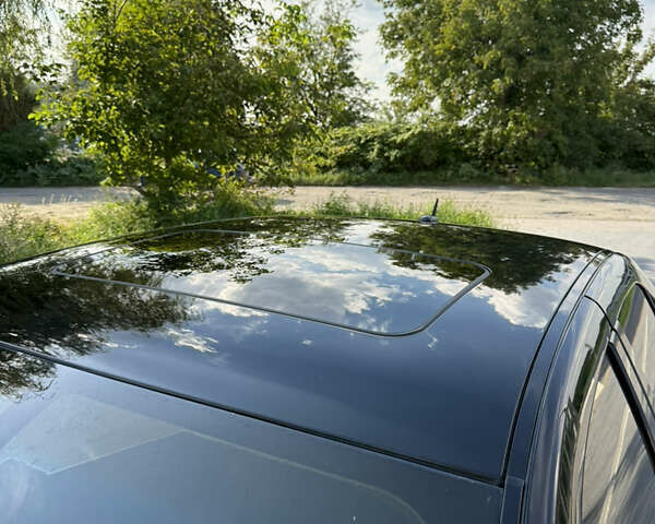 Чорний Каділак STS, об'ємом двигуна 4.6 л та пробігом 284 тис. км за 5700 $, фото 38 на Automoto.ua