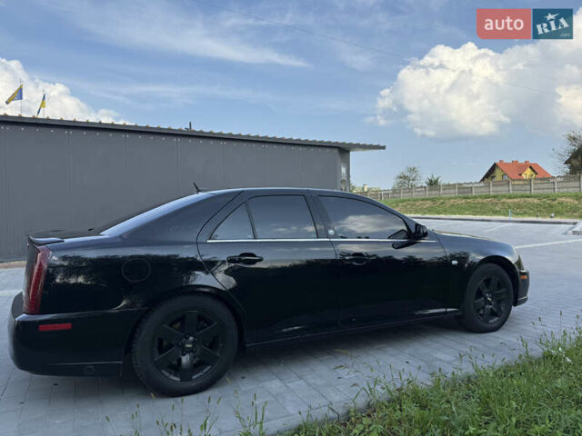 Чорний Каділак STS, об'ємом двигуна 4.6 л та пробігом 284 тис. км за 5700 $, фото 14 на Automoto.ua