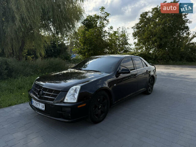 Чорний Каділак STS, об'ємом двигуна 4.6 л та пробігом 284 тис. км за 5700 $, фото 1 на Automoto.ua