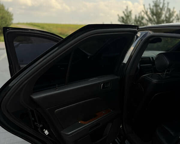 Чорний Каділак STS, об'ємом двигуна 4.6 л та пробігом 284 тис. км за 5700 $, фото 26 на Automoto.ua