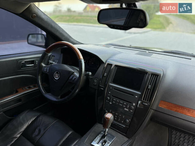 Чорний Каділак STS, об'ємом двигуна 4.6 л та пробігом 284 тис. км за 5700 $, фото 36 на Automoto.ua