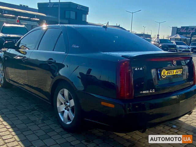 Черный Кадиллак STS, объемом двигателя 4.6 л и пробегом 180 тыс. км за 9500 $, фото 4 на Automoto.ua