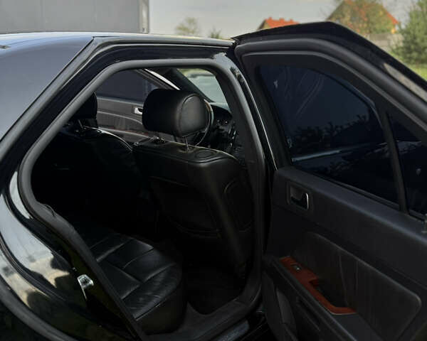Чорний Каділак STS, об'ємом двигуна 4.6 л та пробігом 284 тис. км за 5700 $, фото 31 на Automoto.ua