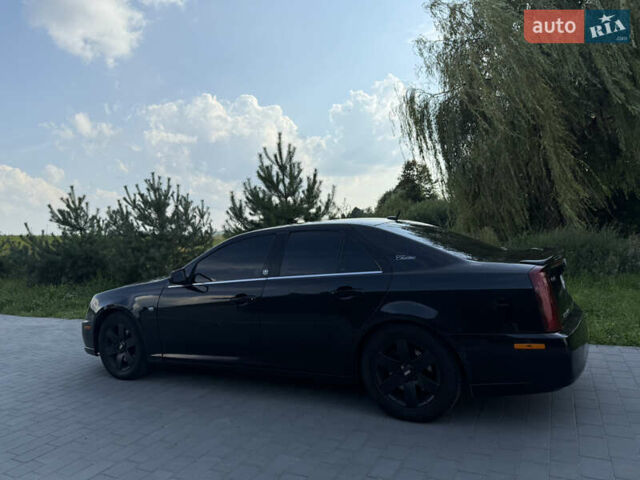 Чорний Каділак STS, об'ємом двигуна 4.6 л та пробігом 284 тис. км за 5700 $, фото 21 на Automoto.ua
