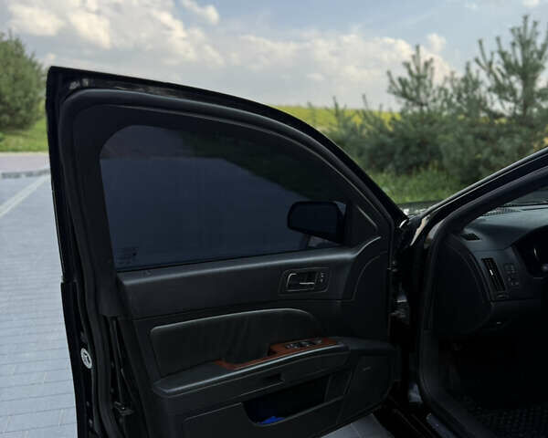 Чорний Каділак STS, об'ємом двигуна 4.6 л та пробігом 284 тис. км за 5700 $, фото 22 на Automoto.ua