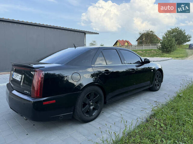 Чорний Каділак STS, об'ємом двигуна 4.6 л та пробігом 284 тис. км за 5700 $, фото 12 на Automoto.ua