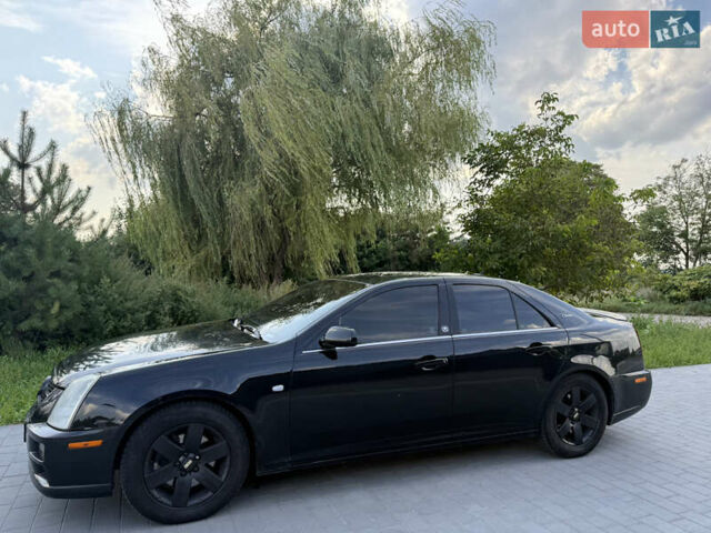 Чорний Каділак STS, об'ємом двигуна 4.6 л та пробігом 284 тис. км за 5700 $, фото 3 на Automoto.ua