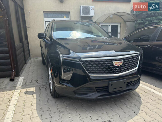 Чорний Каділак XT4, об'ємом двигуна 2 л та пробігом 9 тис. км за 31000 $, фото 1 на Automoto.ua
