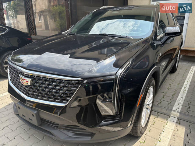 Чорний Каділак XT4, об'ємом двигуна 2 л та пробігом 9 тис. км за 31000 $, фото 2 на Automoto.ua