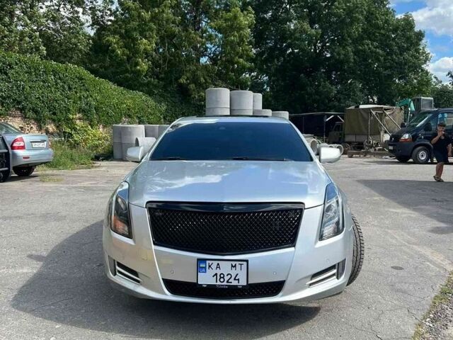 Сірий Каділак XT4, об'ємом двигуна 3.6 л та пробігом 240 тис. км за 14000 $, фото 1 на Automoto.ua